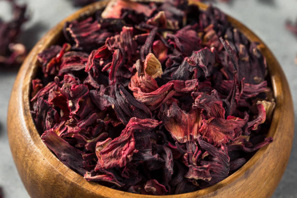 Raw Red Organic Dried Hibiscus Flower Tea in a Bowl